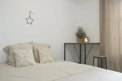 Un ou plusieurs lits dans un hébergement de l'établissement La Chambre Passionnée