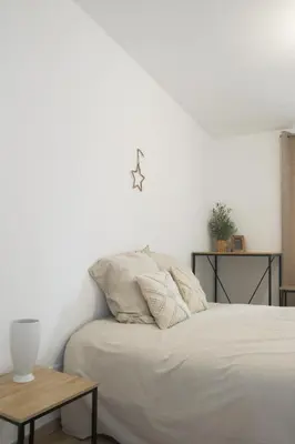 Un ou plusieurs lits dans un hébergement de l'établissement La Chambre Passionnée