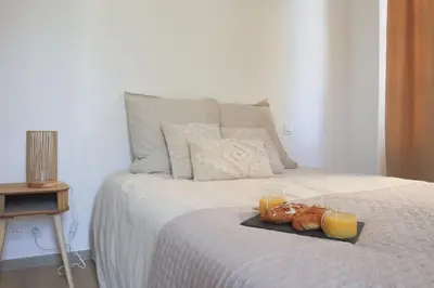Un ou plusieurs lits dans un hébergement de l'établissement La Chambre Aux Anges