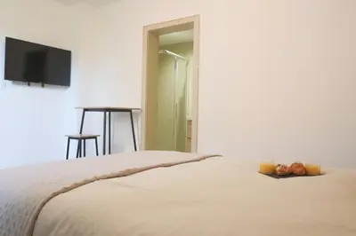 Un ou plusieurs lits dans un hébergement de l'établissement La Chambre Tantra