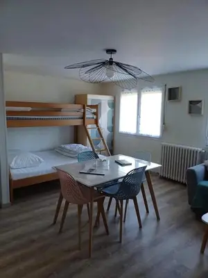 Un ou plusieurs lits dans un hébergement de l'établissement Studio charmant à Cornimont, 30 m², terrasse ensoleillée