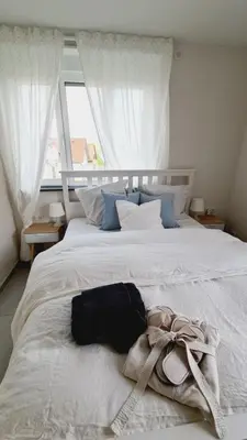 Un ou plusieurs lits dans un hébergement de l'établissement Le Loft de Village-Neuf - Résidence 4 étoiles