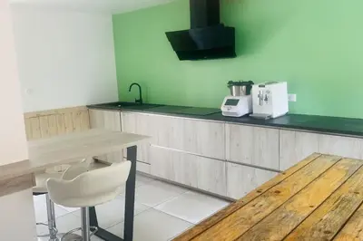 Cuisine ou kitchenette dans l'établissement Maison de Renaud