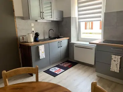 Cuisine ou kitchenette dans l'établissement Appartement 2/4 personnes