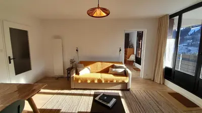 Un ou plusieurs lits dans un hébergement de l'établissement Appartement osca des brimbelles