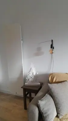 Un ou plusieurs lits dans un hébergement de l'établissement Appartement osca des brimbelles