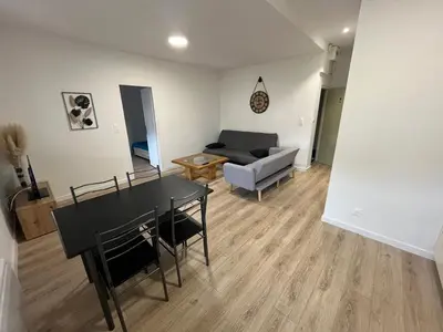 Coin salon dans l'établissement Appartement centre-ville de Lure droit