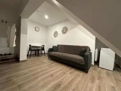 Coin salon dans l'établissement Appartement Douceur