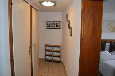 Un ou plusieurs lits dans un hébergement de l'établissement Appartement chaleureux vue sur centre historique