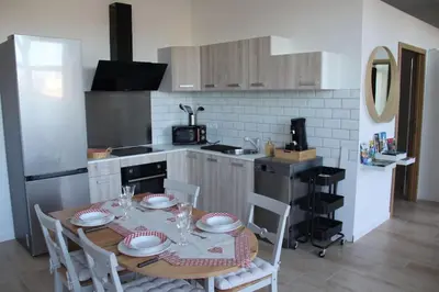 Cuisine ou kitchenette dans l'établissement Escapade Sélest'