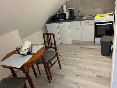 Cuisine ou kitchenette dans l'établissement Aux cigogneaux
