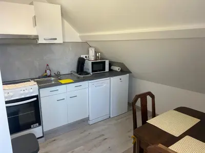 Cuisine ou kitchenette dans l'établissement Aux cigogneaux