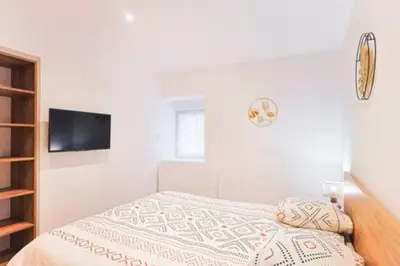 Un ou plusieurs lits dans un hébergement de l'établissement Appartement haut standing avec sauna