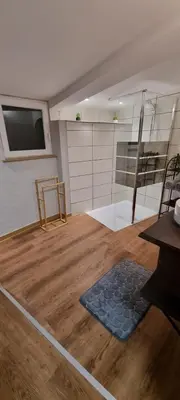 Télévision ou salle de divertissement dans l'établissement Bel appartement avec Balnéo