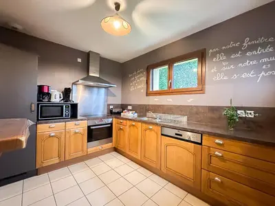 Cuisine ou kitchenette dans l'établissement Le Poulailler des Mios