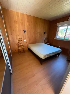 Un ou plusieurs lits dans un hébergement de l'établissement chalet pour amoureux à Gérardmer