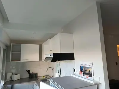 Cuisine ou kitchenette dans l'établissement Appartement proche du centre