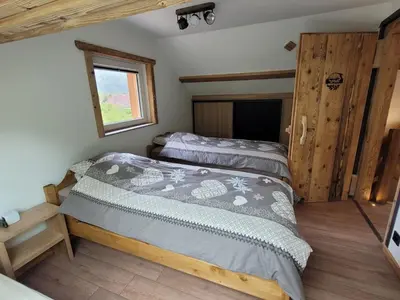 Un ou plusieurs lits dans un hébergement de l'établissement A l'air de Storck - Gîte de montagne 4 étoiles 6-8 personnes