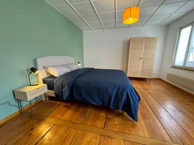 Un ou plusieurs lits dans un hébergement de l'établissement La Maison de l'Ours - Avec Patio & Garage - 8 personnes