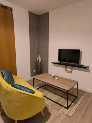 Télévision ou salle de divertissement dans l'établissement Cocon de la vallée