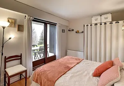 Un ou plusieurs lits dans un hébergement de l'établissement Entre Lac et Montagne - Appt pour 4 - Garage privé