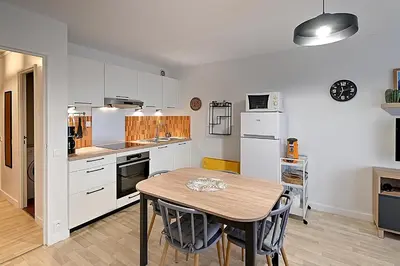 Cuisine ou kitchenette dans l'établissement Entre Lac et Montagne - Appt pour 4 - Garage privé