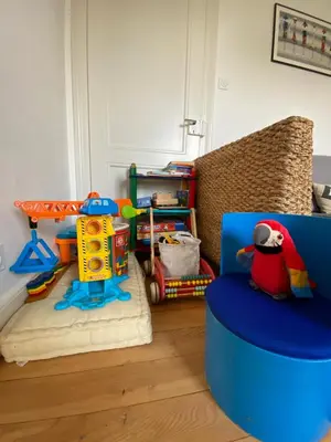 Coin salon dans l'établissement BookingAlsace - Maison Mittelharth Parking Jardin