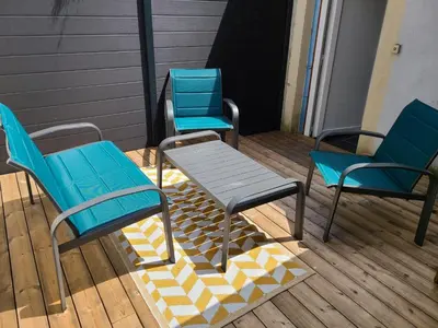 Coin salon dans l'établissement Beau duplex avec garage