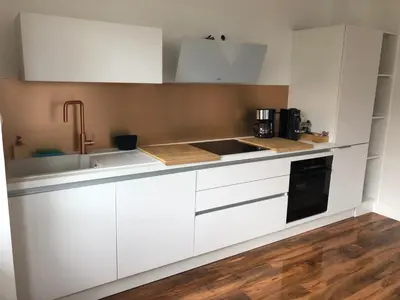 Cuisine ou kitchenette dans l'établissement Le Haut Standing