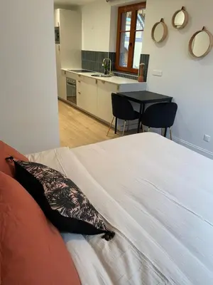 Un ou plusieurs lits dans un hébergement de l'établissement L'Adresse Studio Rempart sud - centre historique Eguisheim