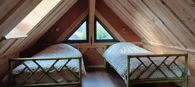 Un ou plusieurs lits dans un hébergement de l'établissement Gîte des Perdrix