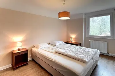 Un ou plusieurs lits dans un hébergement de l'établissement Panoramika - Maison pour 14 vue montagne