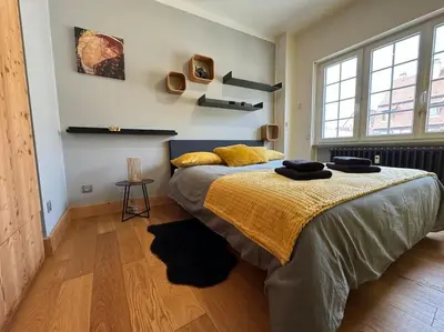 Un ou plusieurs lits dans un hébergement de l'établissement L'Arsenal - Appartement Centre ville - Poche commerces & restaurant - 6 P