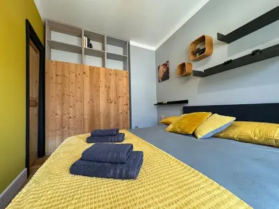 Un ou plusieurs lits dans un hébergement de l'établissement L'Arsenal - Appartement Centre ville - Poche commerces & restaurant - 6 P