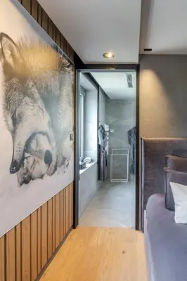 Coin salon dans l'établissement La Loge aux Loups, à 100 m du lac, piscine intérieure, sauna, cheminée, local skis vélos