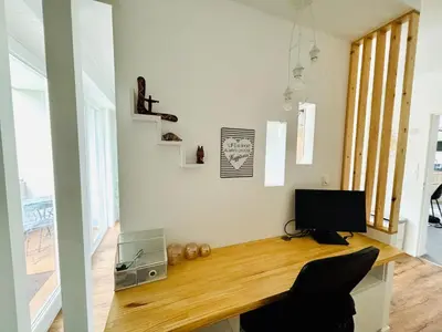 Coin salon dans l'établissement Appartement de standing proche centre ville et gare