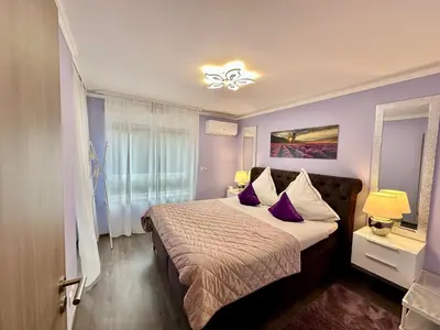 Un ou plusieurs lits dans un hébergement de l'établissement Charming apartment with Garden, Free Parking near Basel, Airport, Ger'many, France,