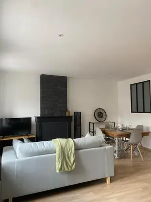 Coin salon dans l'établissement Appartement de la Place