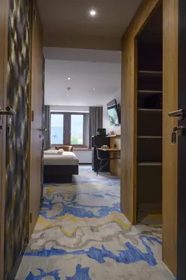 Un ou plusieurs lits dans un hébergement de l'établissement CHATEAU R