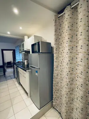 Cuisine ou kitchenette dans l'établissement Thé Pékin