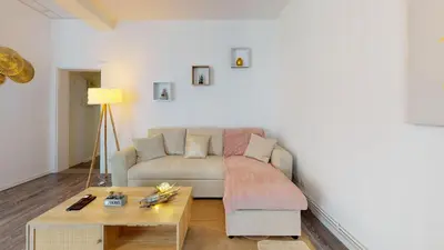 Coin salon dans l'établissement Appartement Le Key6