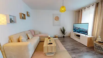 Télévision ou salle de divertissement dans l'établissement Appartement Le Key6