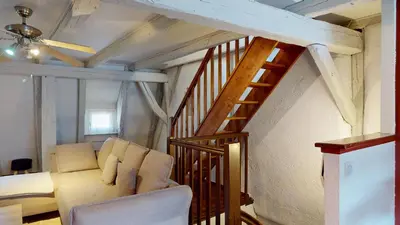 Coin salon dans l'établissement Triplex Le Bel Âtre