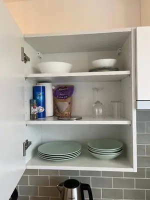Cuisine ou kitchenette dans l'établissement *La Belle Saison* lumineux, espace de travail, Wifi, Belfort ville