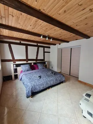 Un ou plusieurs lits dans un hébergement de l'établissement la maison bleue