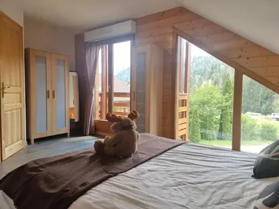 Un ou plusieurs lits dans un hébergement de l'établissement Le Chalet Perla