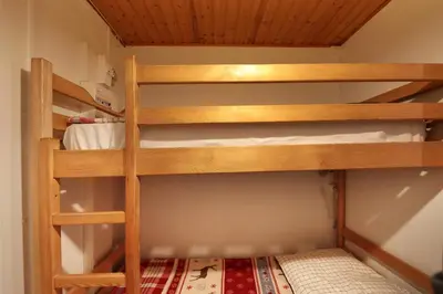 Un ou plusieurs lits superposés dans un hébergement de l'établissement Domaine des Chênes Rouges - Appt 3 étoiles pour 4p dans chalet