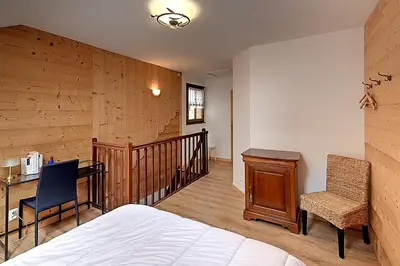 Un ou plusieurs lits dans un hébergement de l'établissement Pré Fleuri 1 - Appt vue lac et montagne