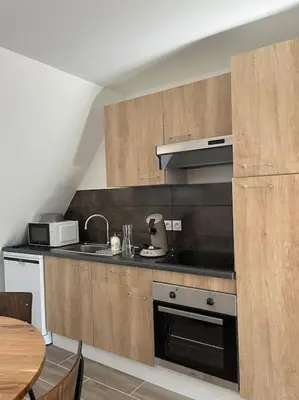 Cuisine ou kitchenette dans l'établissement Gite Clair de Lune à Beblenheim 3 pers parking