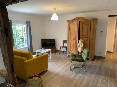 Coin salon dans l'établissement Gite Les Vendanges à Beblenheim Parking privé